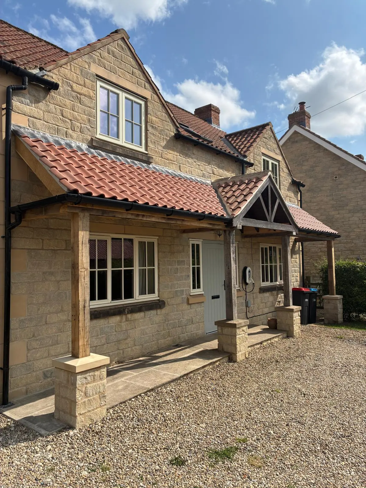Extended pantiled front canopy on an oak frame with stone piers, Kirkbymoorside
